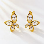 A pair of gold butterfly-shaped stud earrings with marquise-cut clear crystals, displayed on a clean white background with soft shadows.